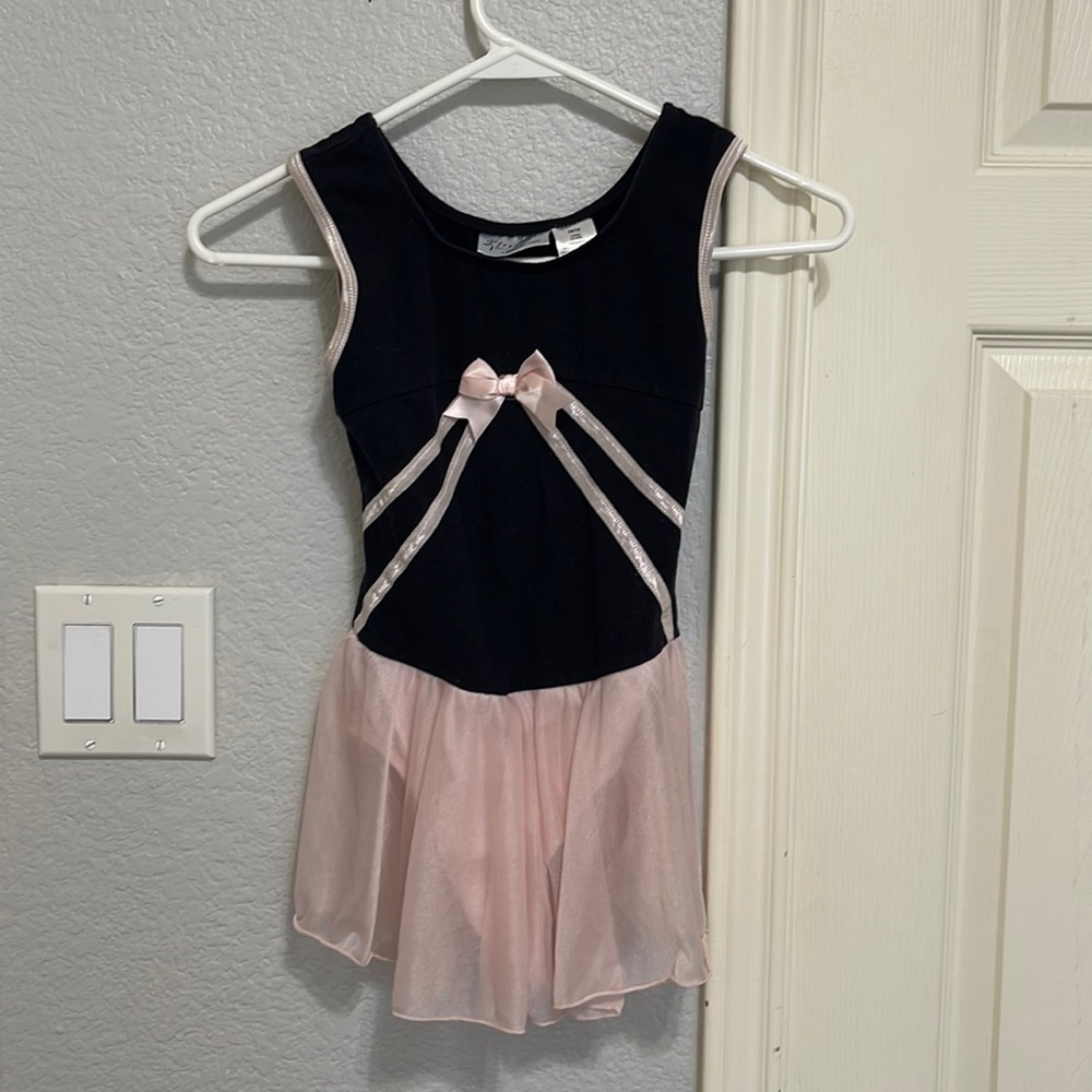 Danskin pink and black ballet leotard with attached skirt. Size 10/12
